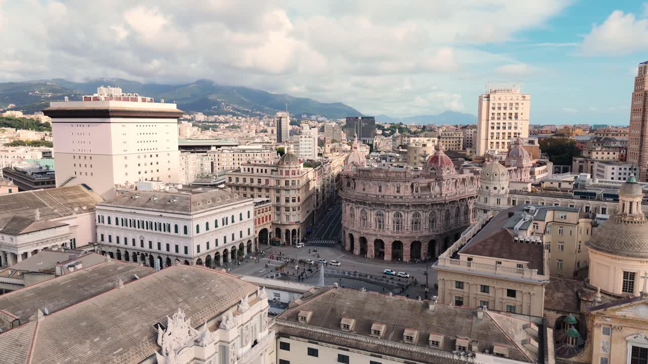 Genoa's historic center with ornate architecture and bustling city streets, aerial view