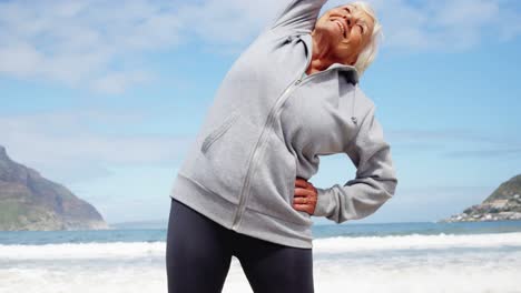 Senior-woman-performing-stretching-exercise