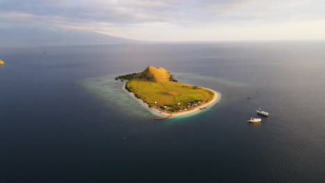 aerial shot of kenawa island at sunset in sumbawa, indonesia