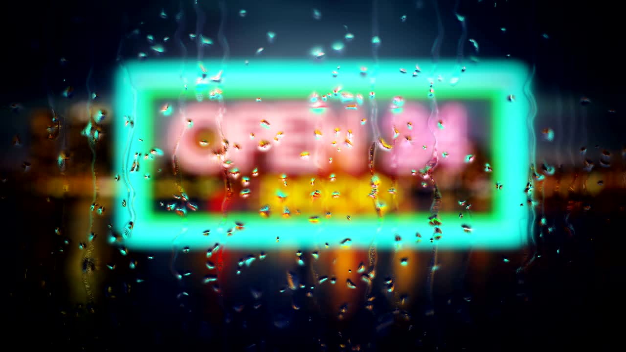 네온 표지판 '24 개방'은 비방울을 통해 드러납니다.