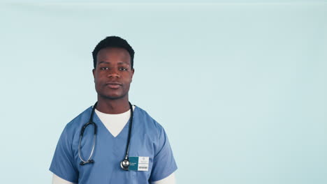 Portrait,-studio-and-black-man-doctor-pointing