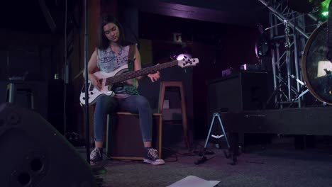 female musician rehearsing before performing