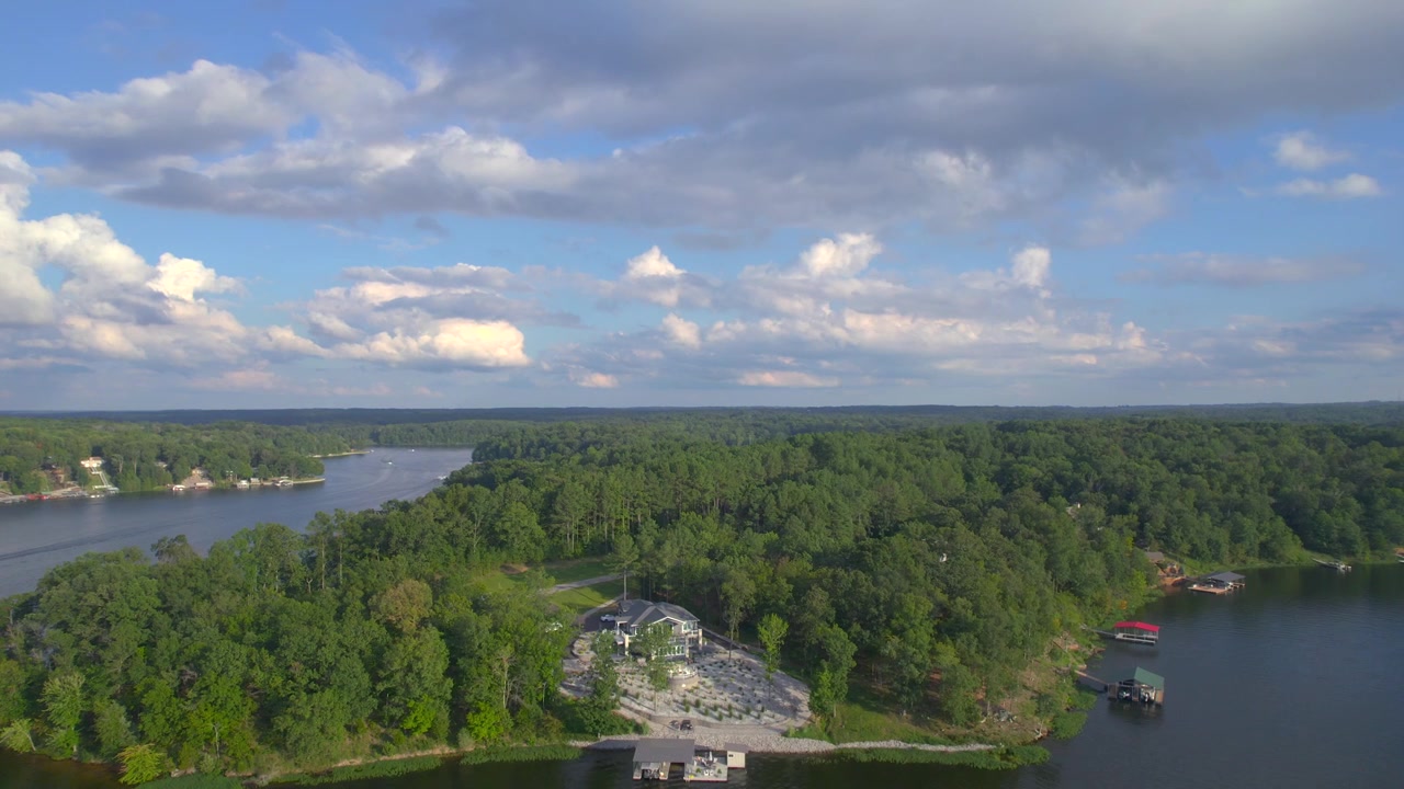Up and away drone view of a lakehouse at Lake of Egypt