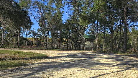 shady-gravel-trail-and-signage-near-Florida-trail-in-Florida-panhandle