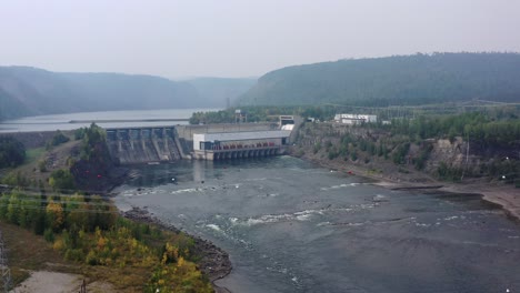 drone view of peace canyon power plant in stunning british columbia wilderness