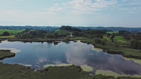 a beautiful lake reflecting the sky in southern germany