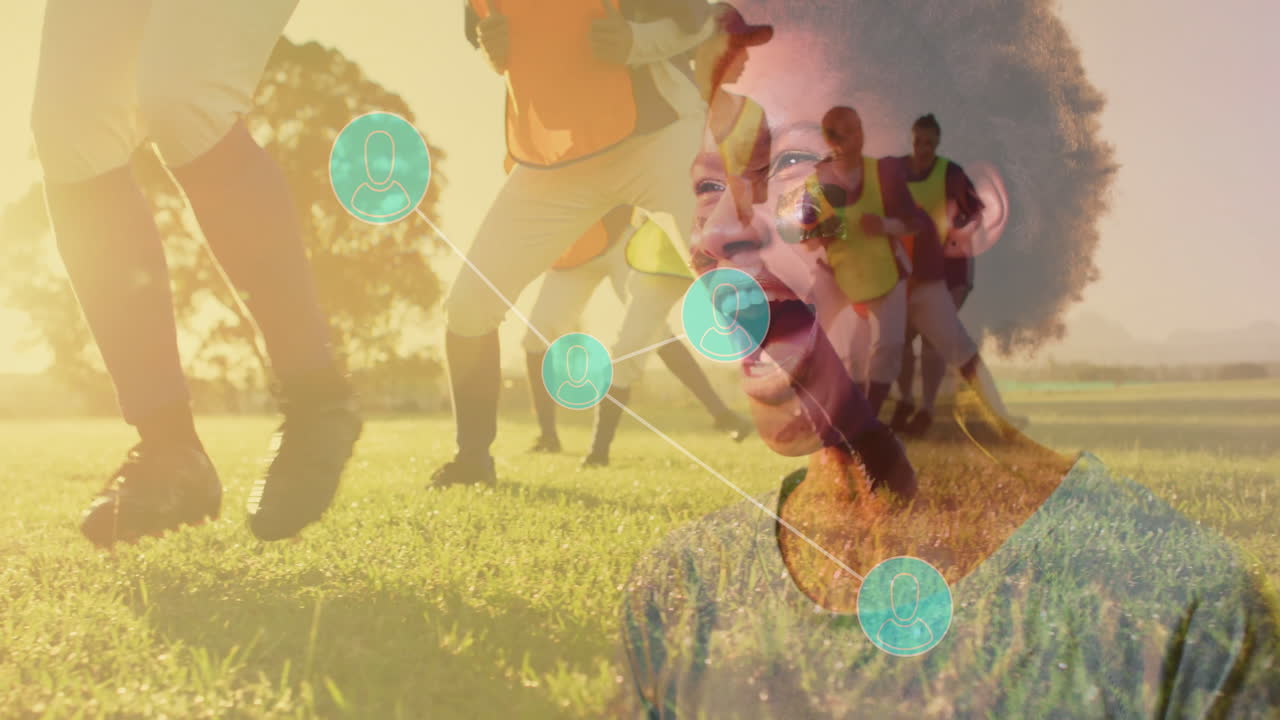In school, child watching animation of network connections with soccer players