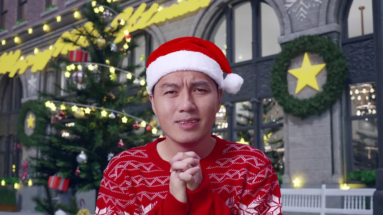 산타 모자와 크리스마스 스웨터를 입은 남자