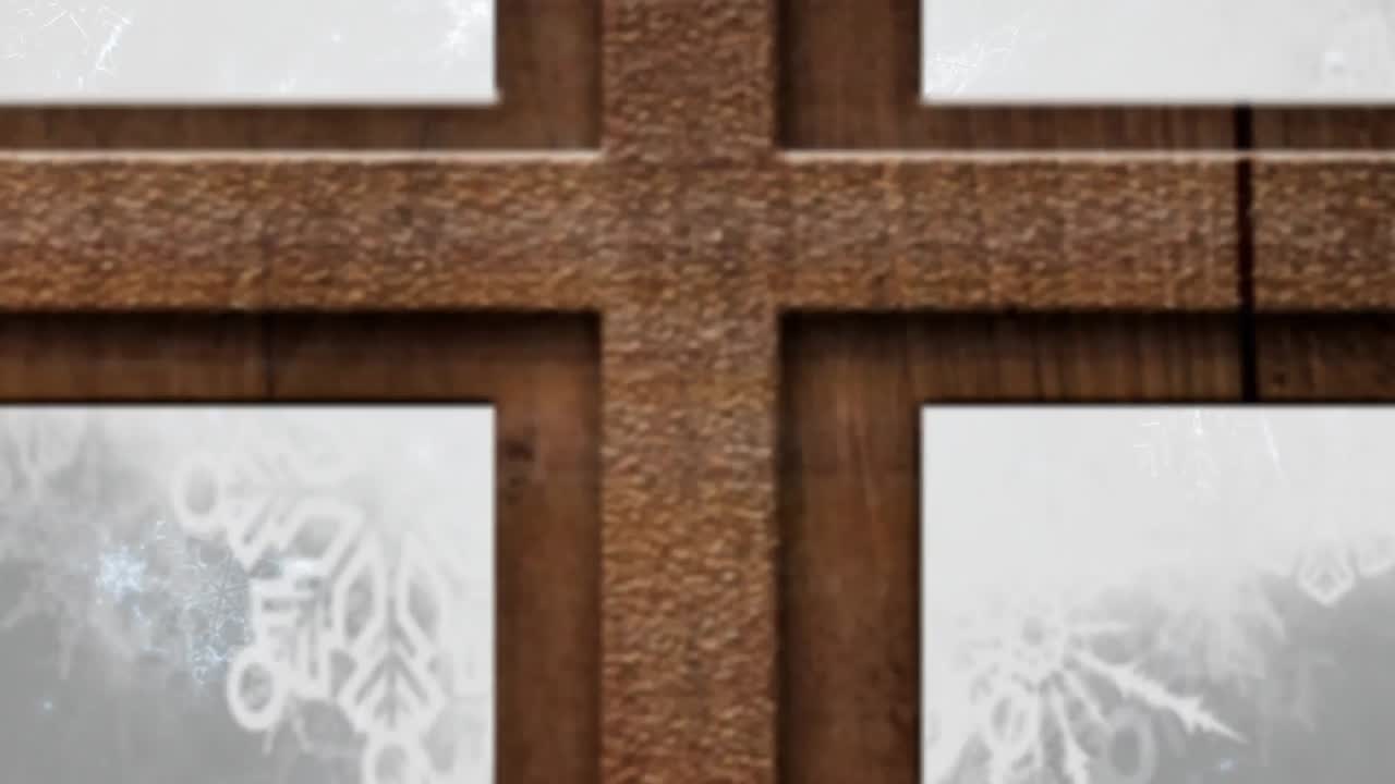 animación del paisaje de invierno y el globo de nieve visto a través de la ventana