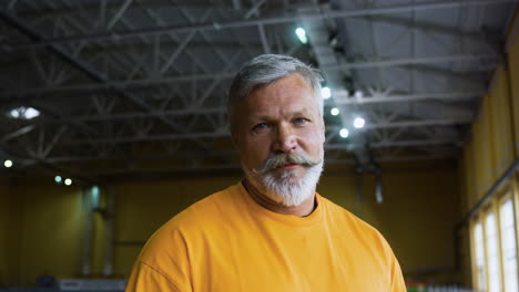 senior man in a running track