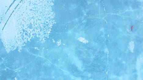 aerial shot of frozen lake raudavatn, near reykjavík, iceland