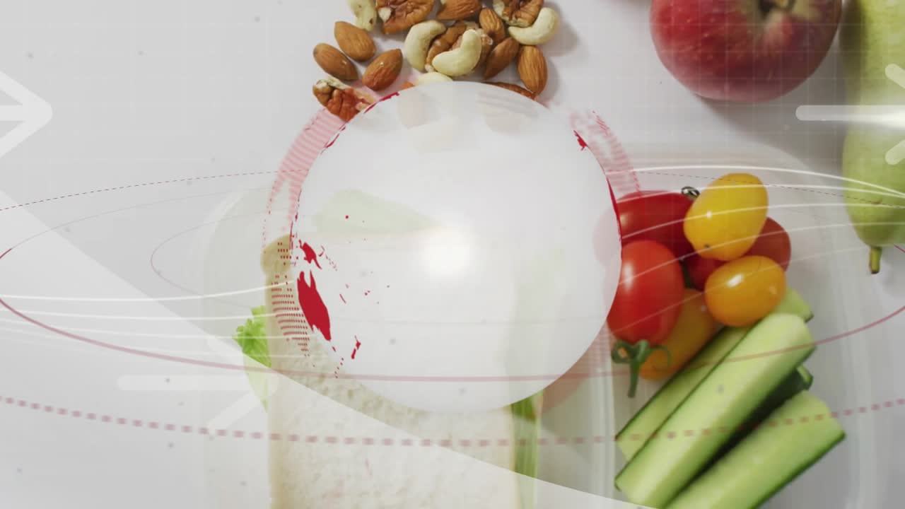 ロード中に赤と白の地球儀が回転しながらフェードアウトし、その間、健康的な食品が現れて食事のレイアウトを明らかにする。