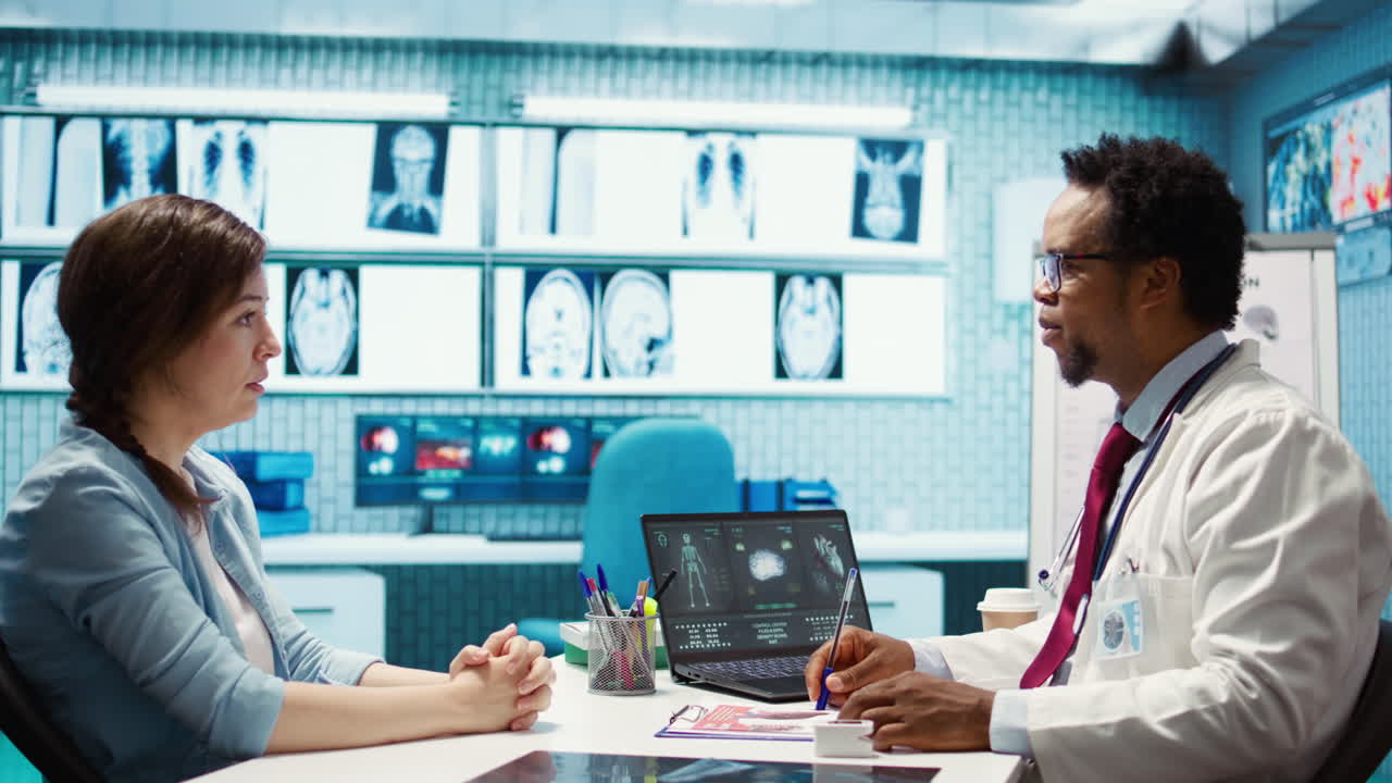 Portrait of specialist with medical disposable gloves examining a patient in cabinet