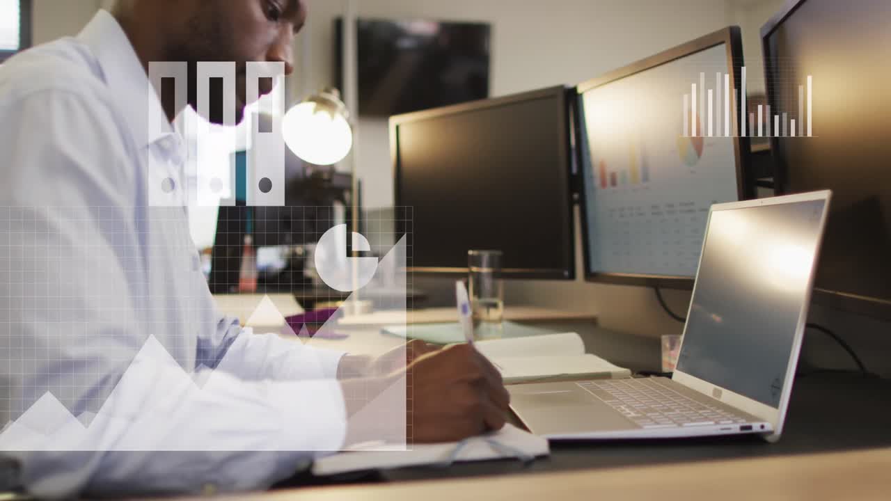 Animation of data processing over african american businessman using computer in office