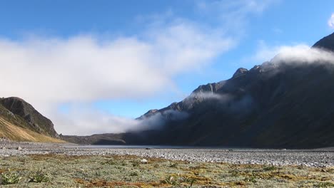 Time-lapse-with-moving-clouds-in-the-moutains-at-Lake-Constance,-Rotopōhueroa,-Nelson,-New-Zealand