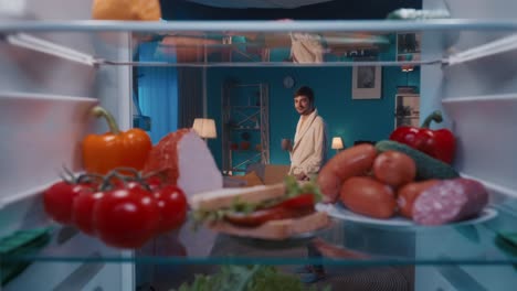 inside the fridge at night