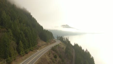 aerial panoramic view of sea to sky highway near horseshoe bay during a sunny winter evening before sunset