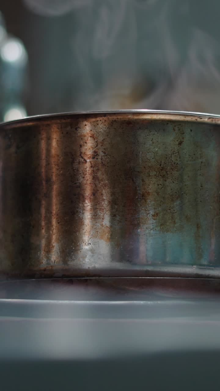Metal pot with steam