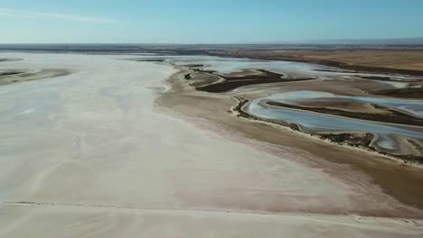 aerial footage moving sideways of landforms near the edge of lake tyrell, in north-west victoria, may 2021.
