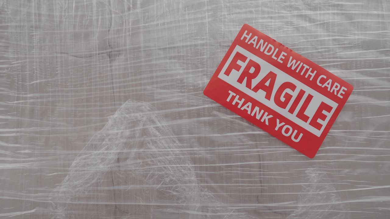 Fragile Package Label on Wrapped Object