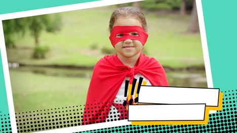 little girl wearing a superhero costume at a park