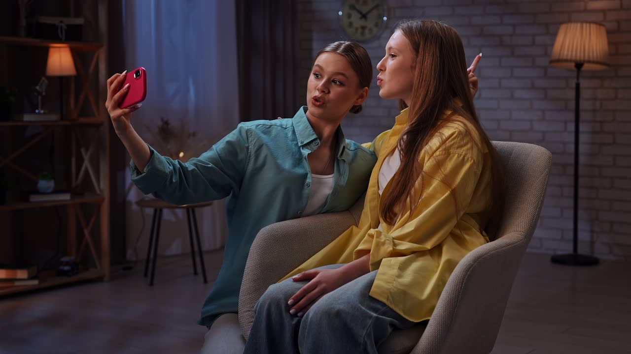 Two friends taking a selfie at home
