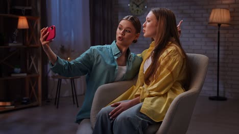 two friends taking a selfie at home