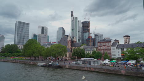 view of the financial district with the river main in the foreground