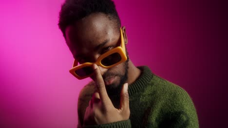 stylish man in yellow sunglasses