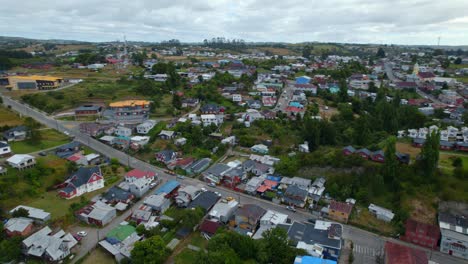 Aerial-orbit-establishing-Chonchi,-a-small-village-in-Chiloe,-Chile