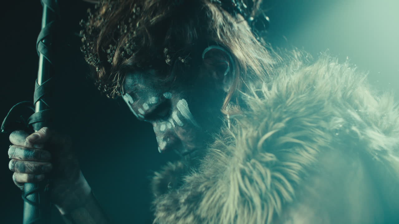 A creepy witch rises her head during the night storm