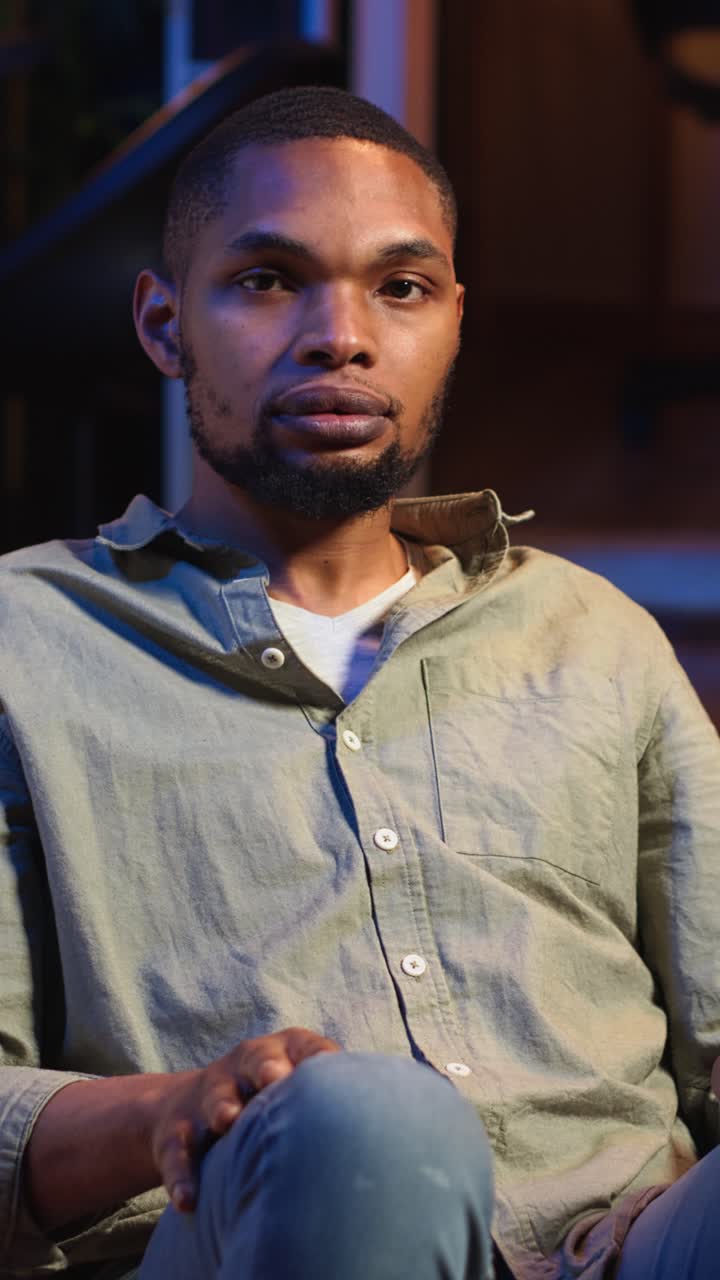 Vertical Video African american guy engaging in a virtual workshop to learn skills for new job