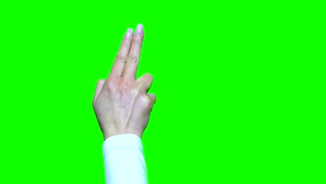 gestos de la mano. pantalla táctil. mano femenina que muestra gestos multitáctiles en pantalla verde con alfa mate en la segunda mitad. video de stock uhd