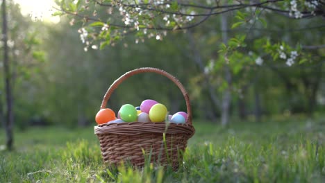 close up of colorful easter eggs in a basket