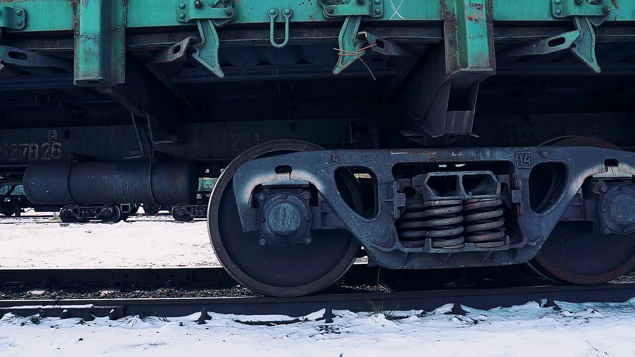Railway wagon with cargo. The movement of the train