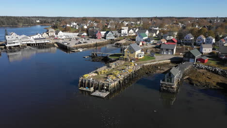 Aerial-High-Pan-Drone-Footage-over-Lobster-Fishery-at-Maine-Coast-of-Vinalhaven,-Fox-Islands,-Knox-County-Maine,-USA