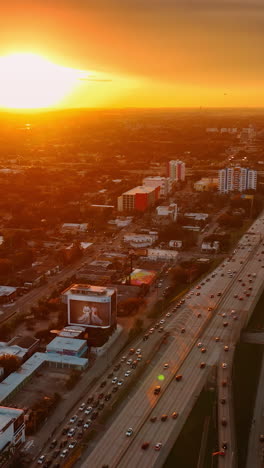amazing golden hour above the metropolis. splendid top view of miami panorama at sunset time. vertical video