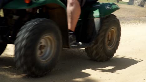 4x4-quad-ride-on-path-moving-towards-camera,-Shot-stabilized