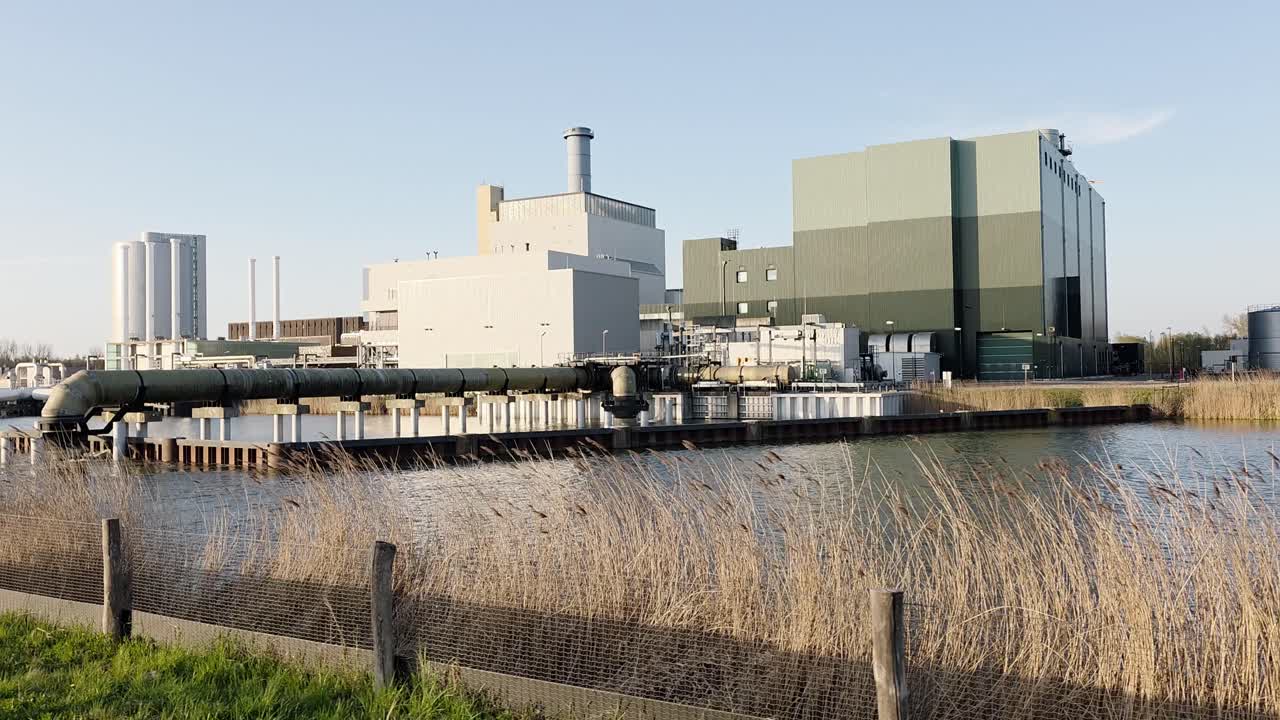 Moving past an electricity factory generating power by using gas