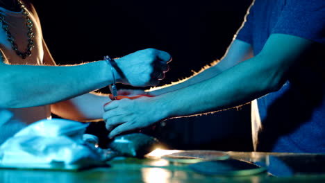 police arrest drug trafficker with handcuffs. law and police concept. criminal business.