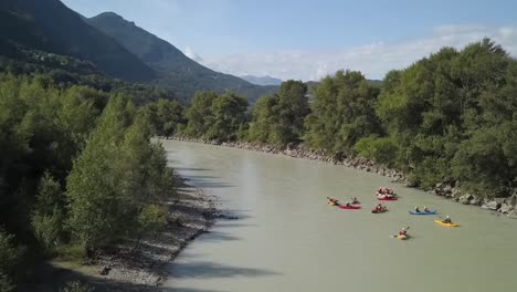 shot of canoes going upon the wild river in france