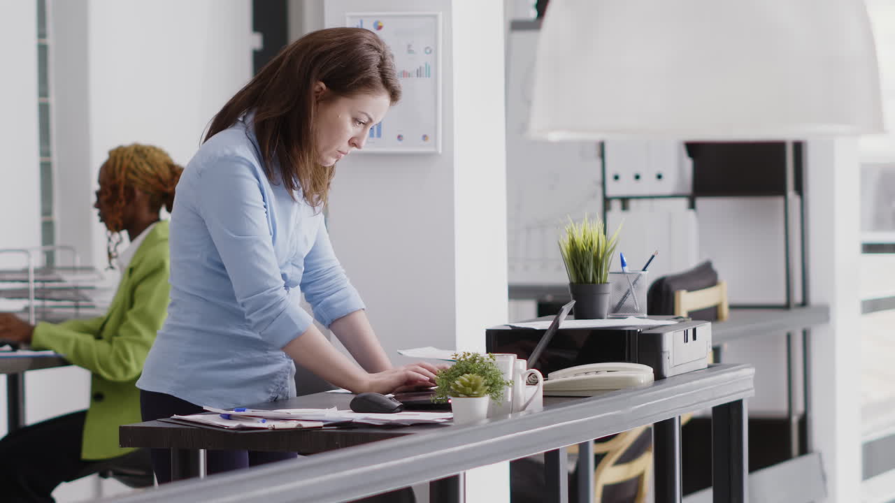 Office scene with employees working