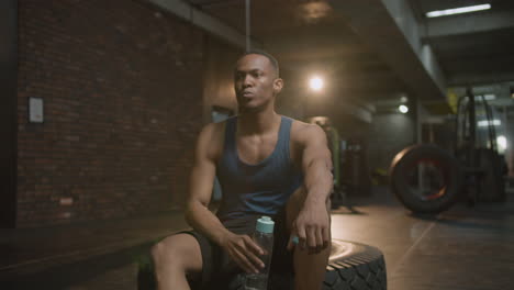 close-up view of an athletic african american man in the gym.