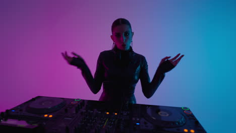 woman djing in a studio