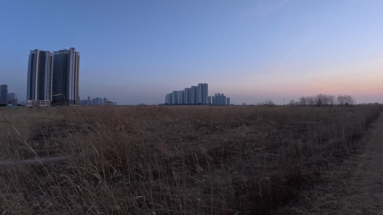 Panorama Of Songdo International Business District Skyline At Dusk. Incheon, South Korea. panning shot
