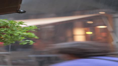 rainy night at an outdoor cafe