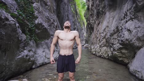 stretching exercises on the stream in the canyon, sports.