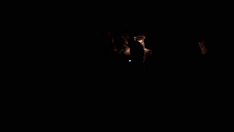 man Explorer in Cave Speleology Dungeon Dark Tunnel Underground Excavation Man Explorer in Cave Speleology Dungeon Dark Tunnel Underground Excavation Slow Motion