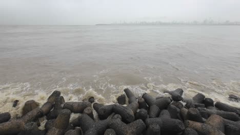 marine lines mumbai india south bombay rainy season waves splashed rocks skyline