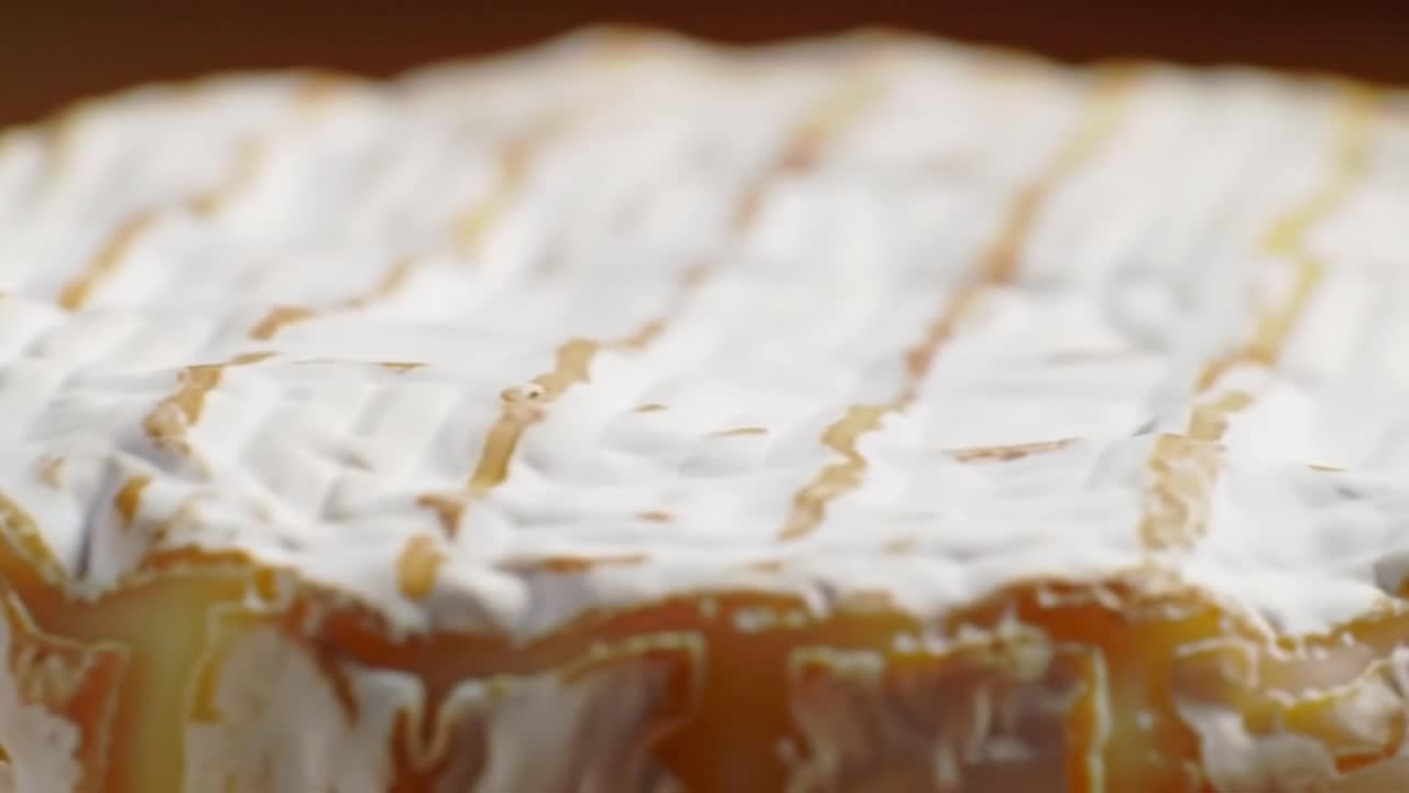 Savory cheese is crafted through a meticulous process showcasing rich textures and flavors. This artisan method highlights the craftsmanship behind delightful dairy products.